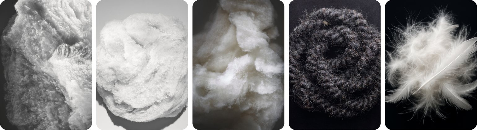 Wool, cotton, cashmere, horsehair, feather and down mattress topper fillings close up
